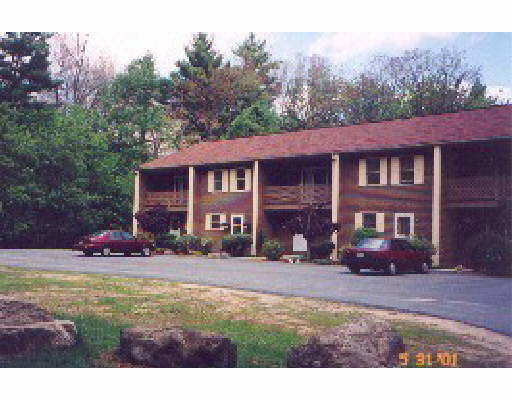 5 May Brook Road, Unit 6 Holland, MA 01521 - Photo 1 of 1 a view of a house with a yard