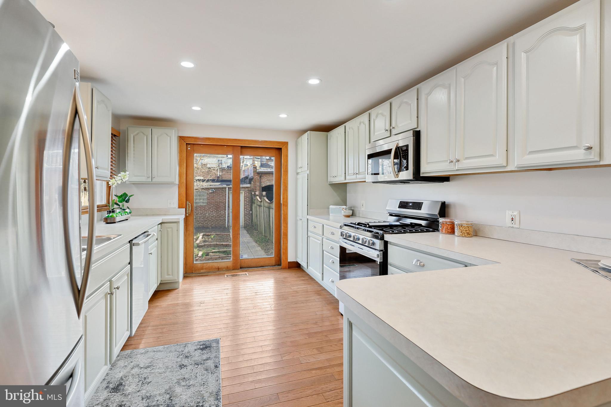 809 Hollins Street Baltimore, MD 21201 - Photo 18 of 59 Natural light bathes the kitchen
