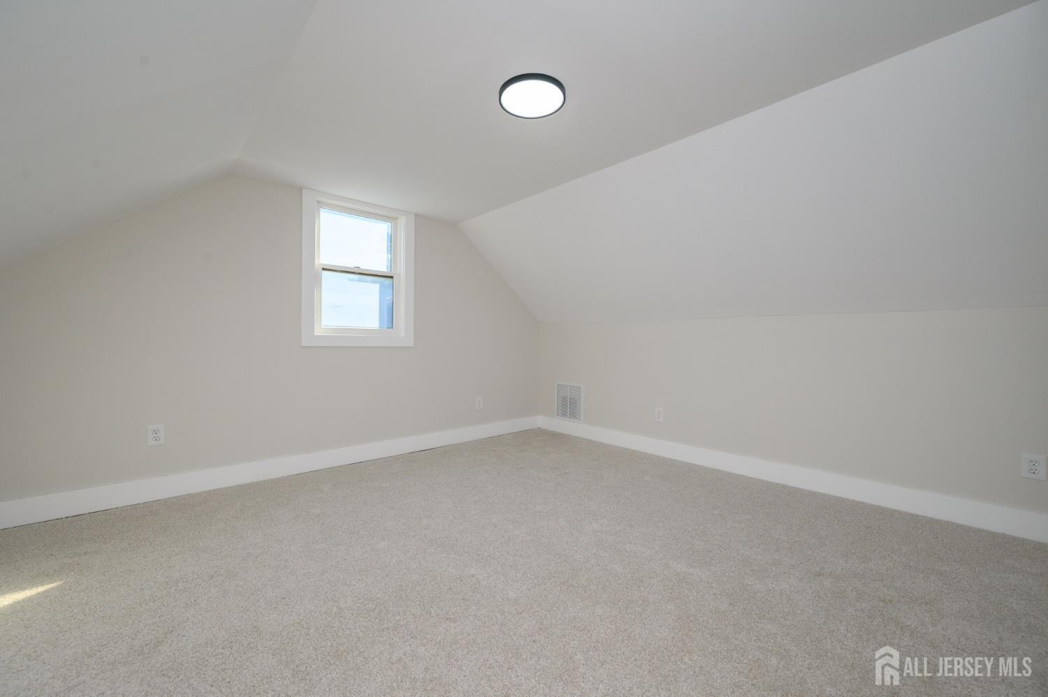 333 1st Street Middlesex, NJ 08846 - Photo 24 of 24 a view of an empty room with a window