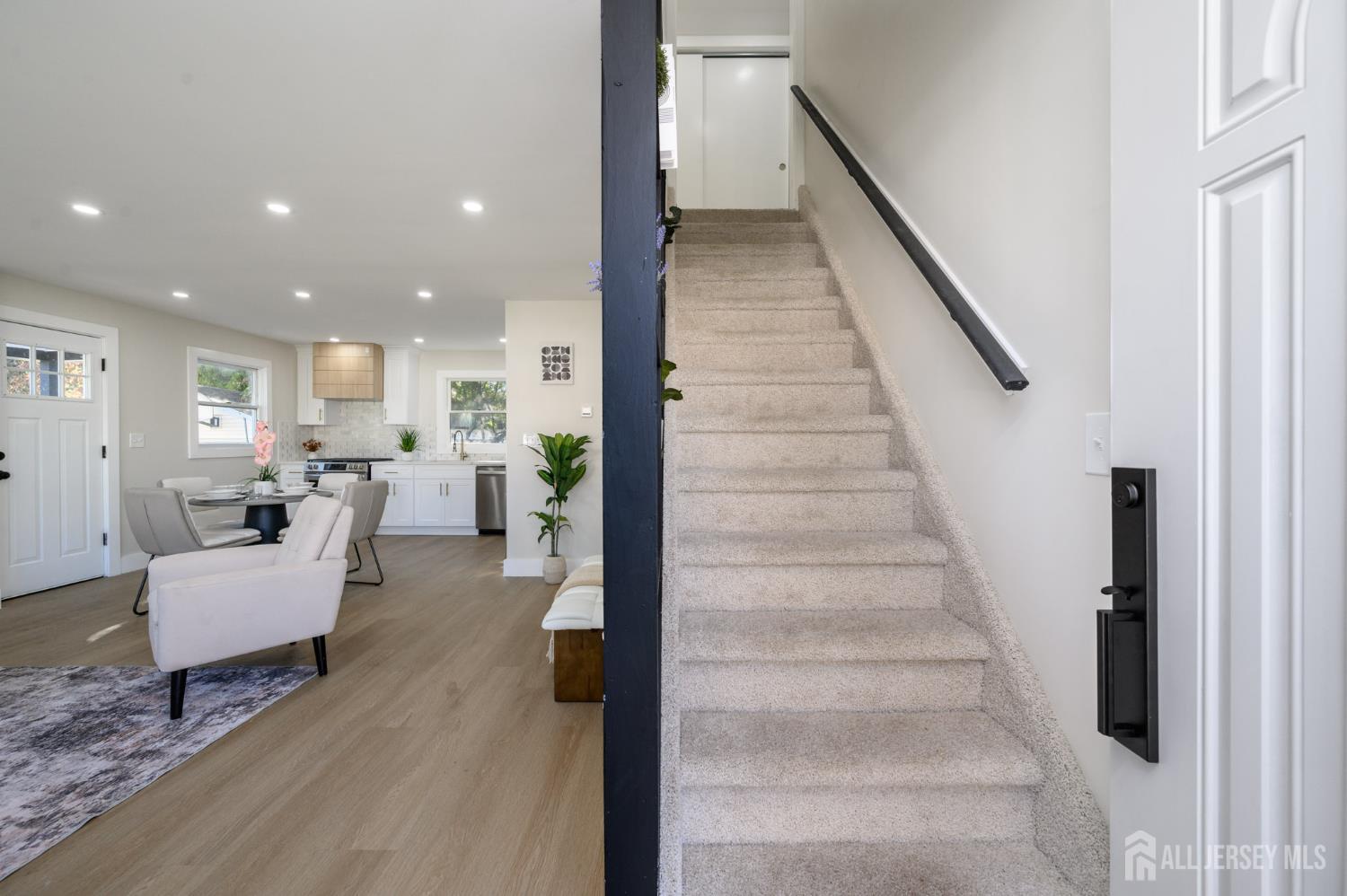 333 1st Street Middlesex, NJ 08846 - Photo 3 of 24 a living room with furniture and wooden floor