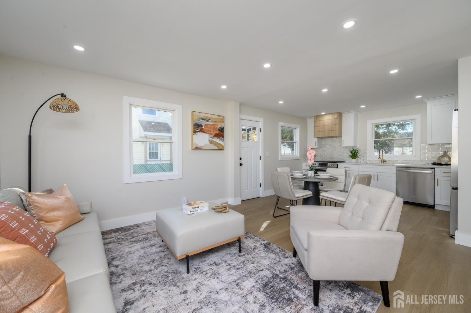 333 1st Street Middlesex, NJ 08846 - Photo 6 of 24 a living room with furniture and a couch