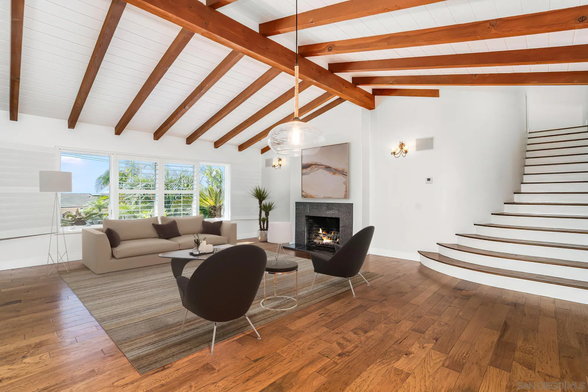 5247 Chelsea Street La Jolla, CA 92037 - Photo 11 of 29 a living room with furniture and a fireplace