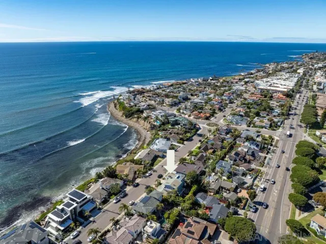 a view of a house with a garden
