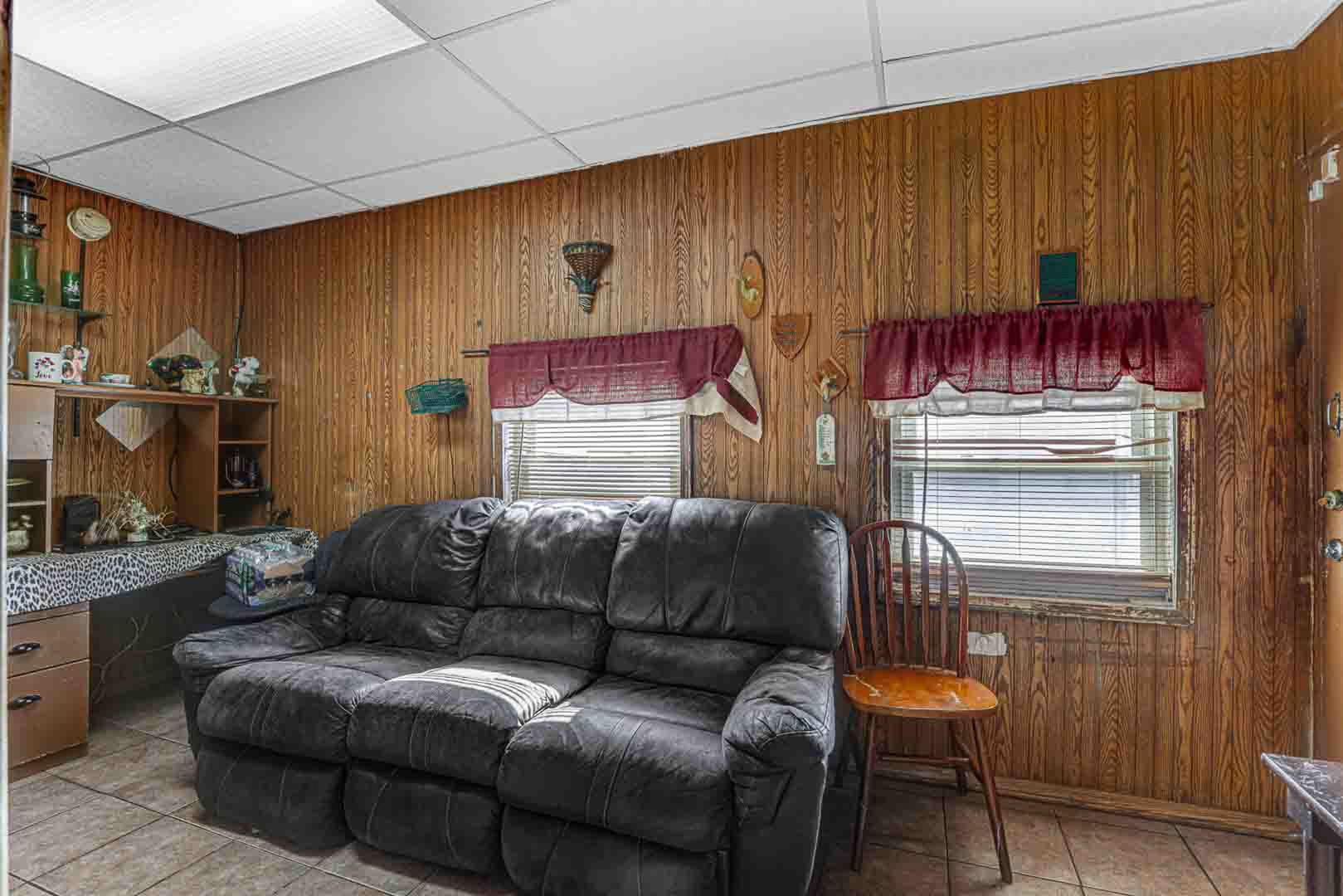 7510 South Carpenter Street Chicago, IL 60620 - Photo 14 of 23 a living room with furniture and a fireplace