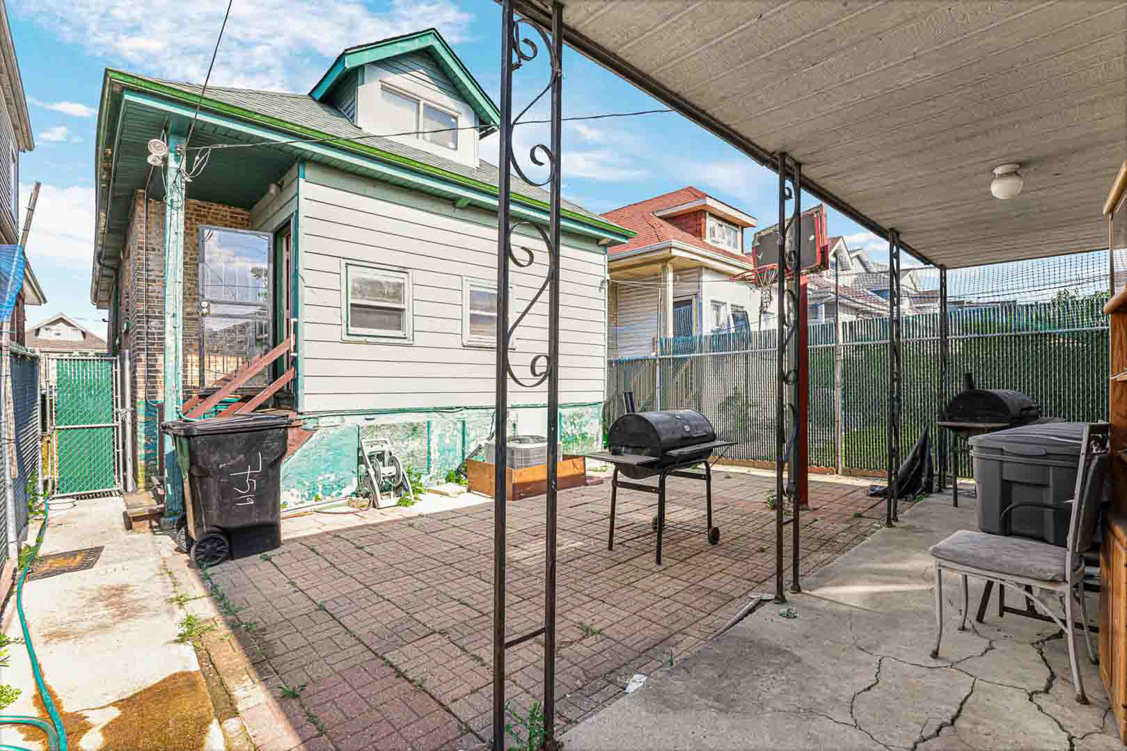 7510 South Carpenter Street Chicago, IL 60620 - Photo 22 of 23 a patio with table and chairs