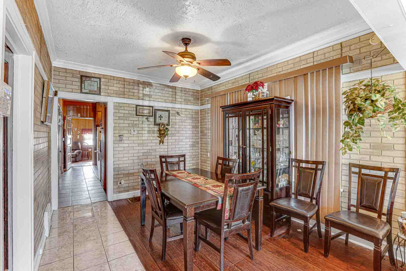 7510 South Carpenter Street Chicago, IL 60620 - Photo 5 of 23 a view of a dining room with furniture window and wooden floor