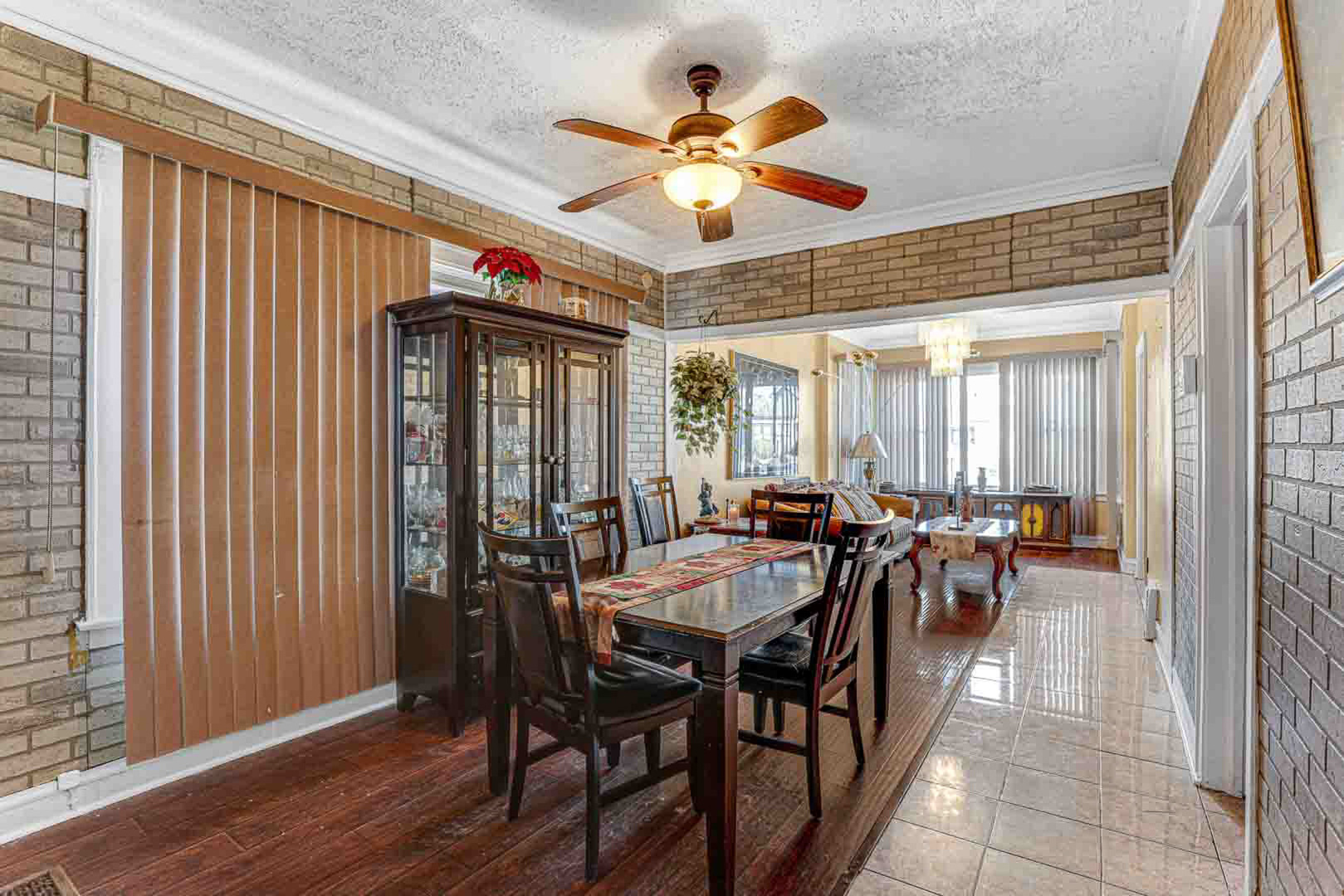 7510 South Carpenter Street Chicago, IL 60620 - Photo 6 of 23 a view of a a dining room with furniture window and wooden floor