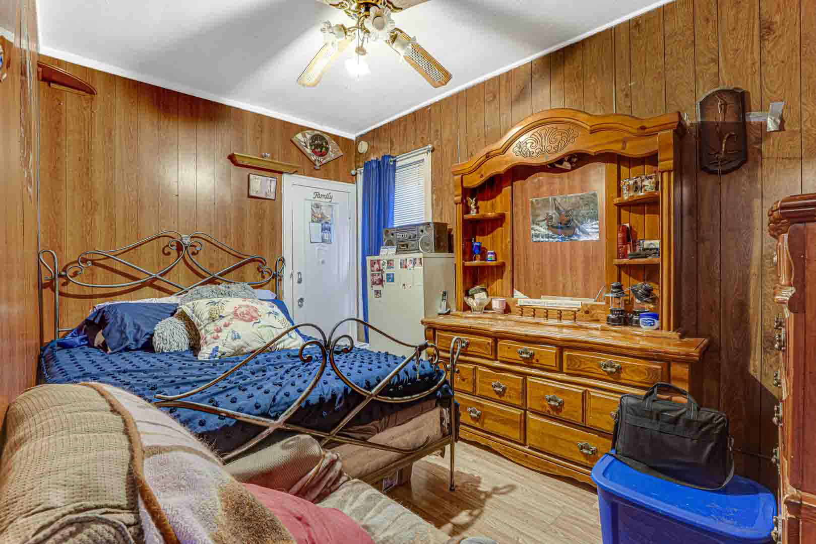 7510 South Carpenter Street Chicago, IL 60620 - Photo 7 of 23 a bedroom with furniture and a mirror