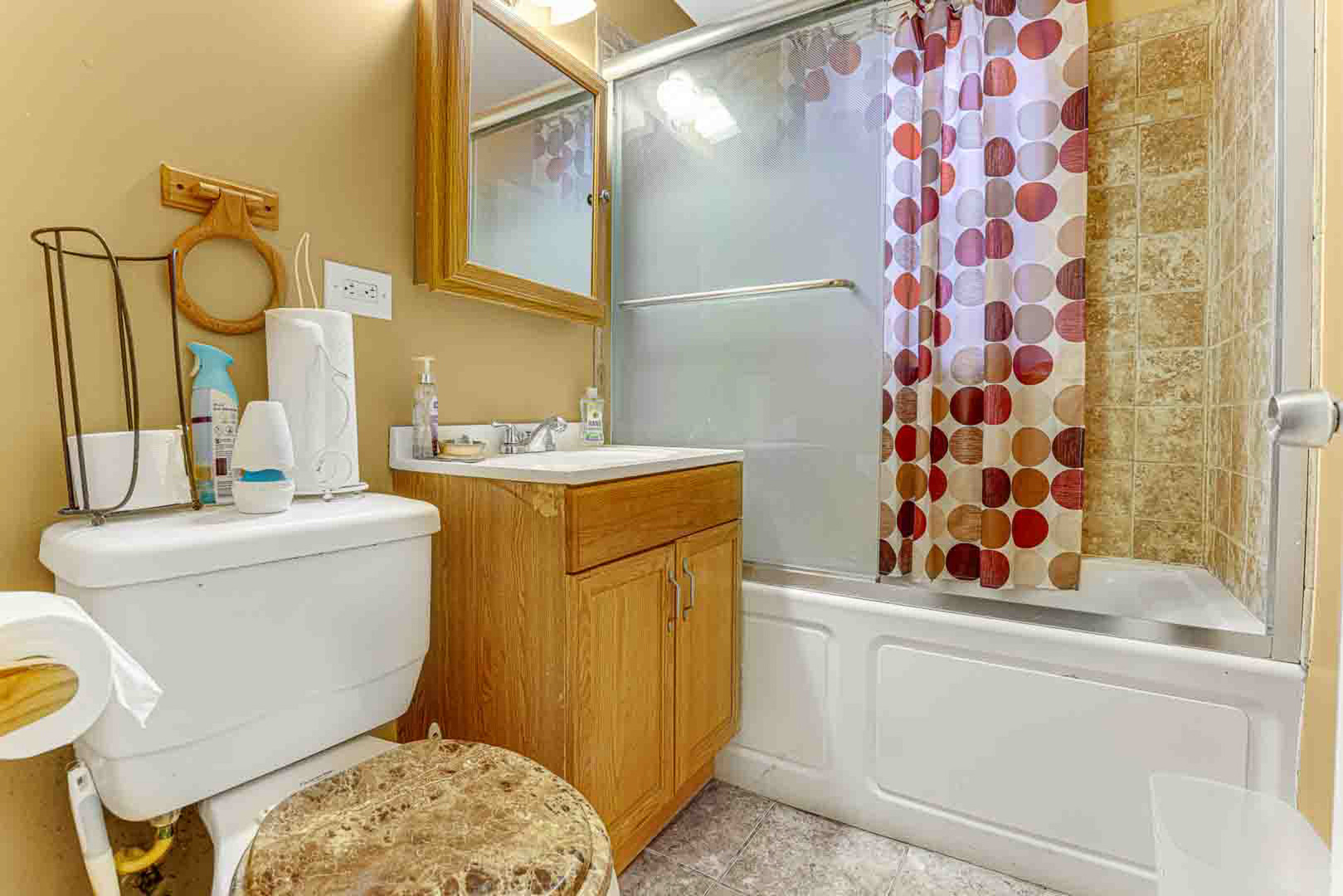7510 South Carpenter Street Chicago, IL 60620 - Photo 8 of 23 a bathroom with a sink toilet and shower