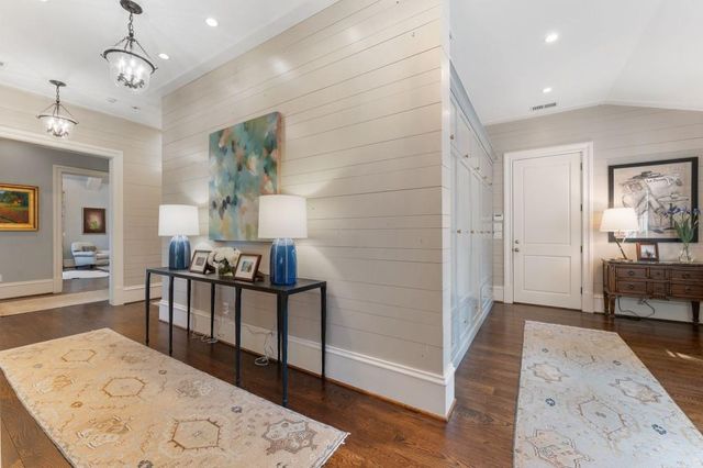 a bathroom with a sink toilet and a mirror