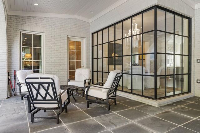 a bathroom with a toilet sink and shower