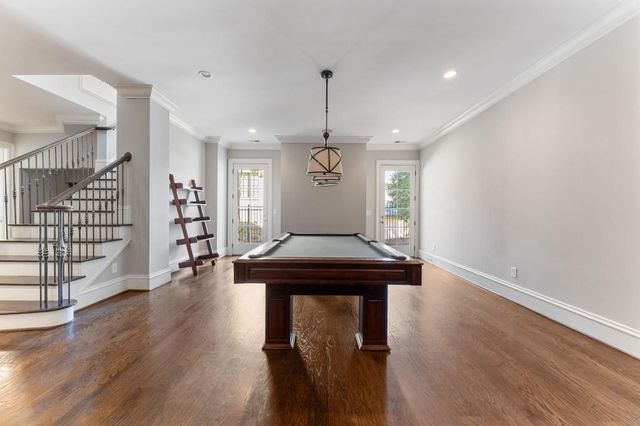 an aerial view of a house with outdoor space
