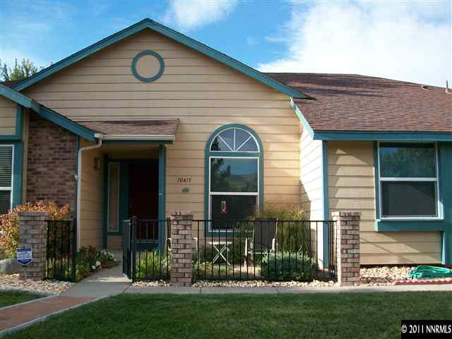 10415 Nighthawk Circle Reno, NV 89523 - Photo 2 of 13 a view of a house with a small yard