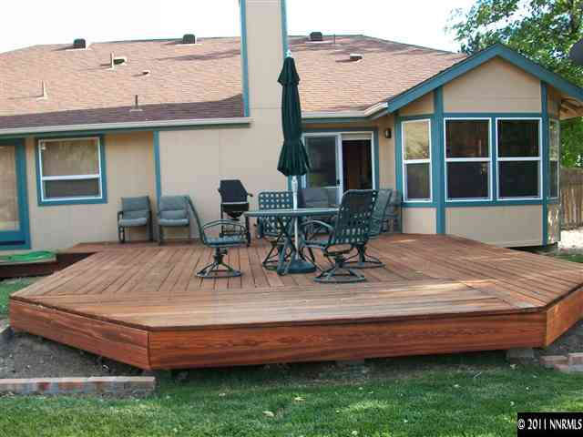 10415 Nighthawk Circle Reno, NV 89523 - Photo 3 of 13 a view of house with backyard outdoor seating area and furniture
