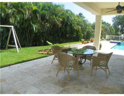 4 Castle Hill Way Stuart, FL 34996 - Photo 13 of 16 a view of an outdoor space with table and chair
