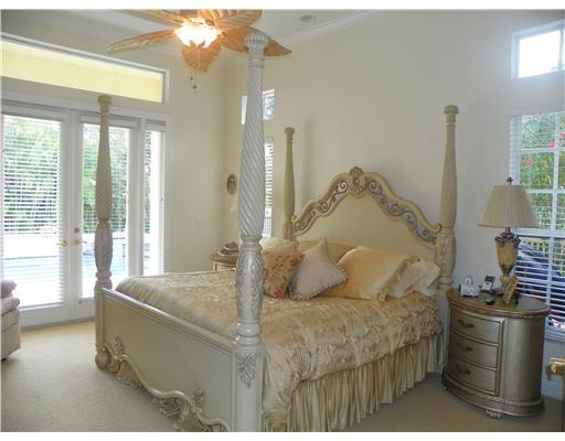 4 Castle Hill Way Stuart, FL 34996 - Photo 15 of 16 a living room with furniture and a fireplace