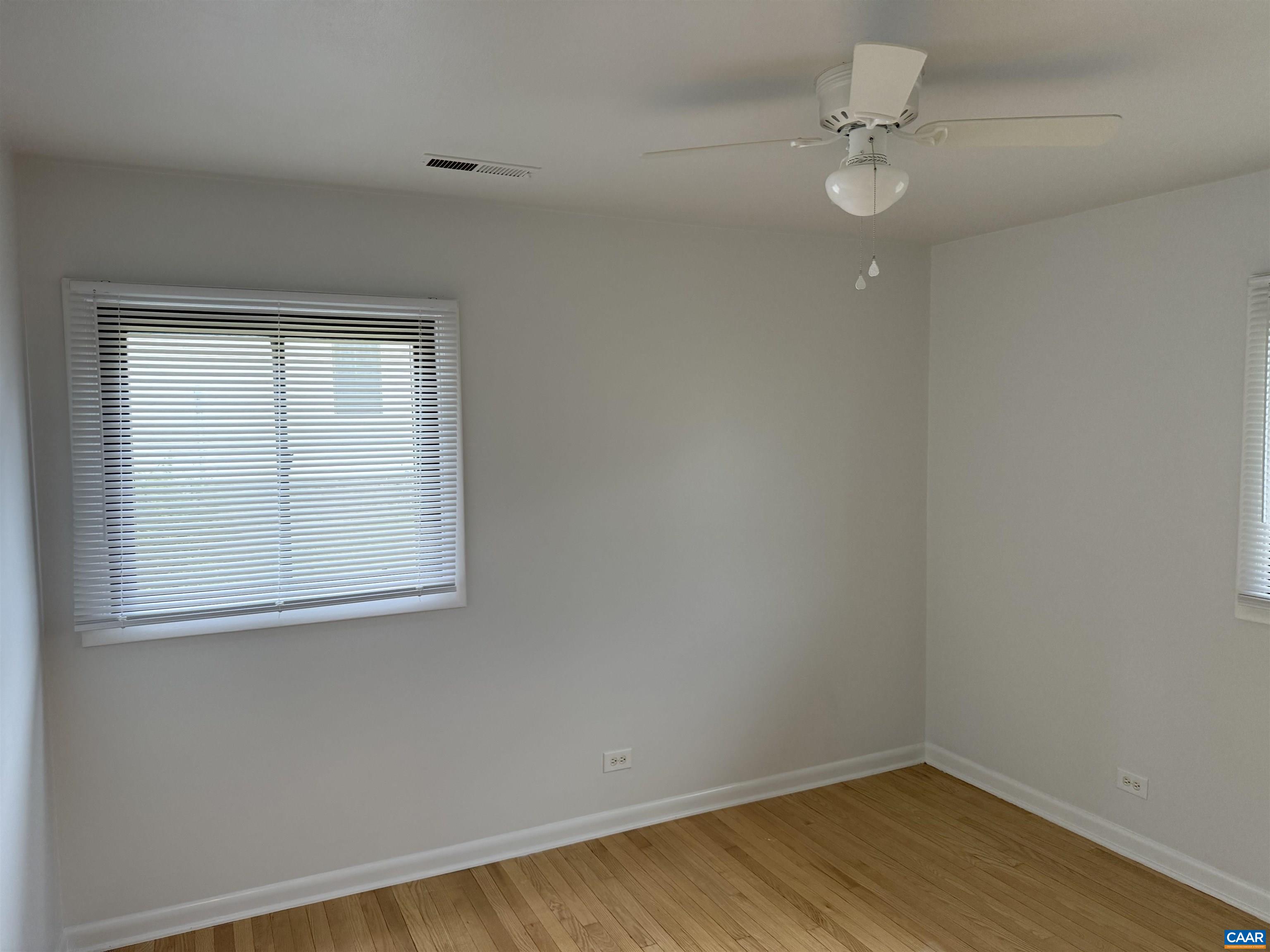 115 Apple Tree Road Charlottesville, VA 22903 - Photo 7 of 11 an empty room with a window