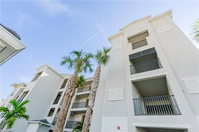 a view of a house with outdoor space and sitting area