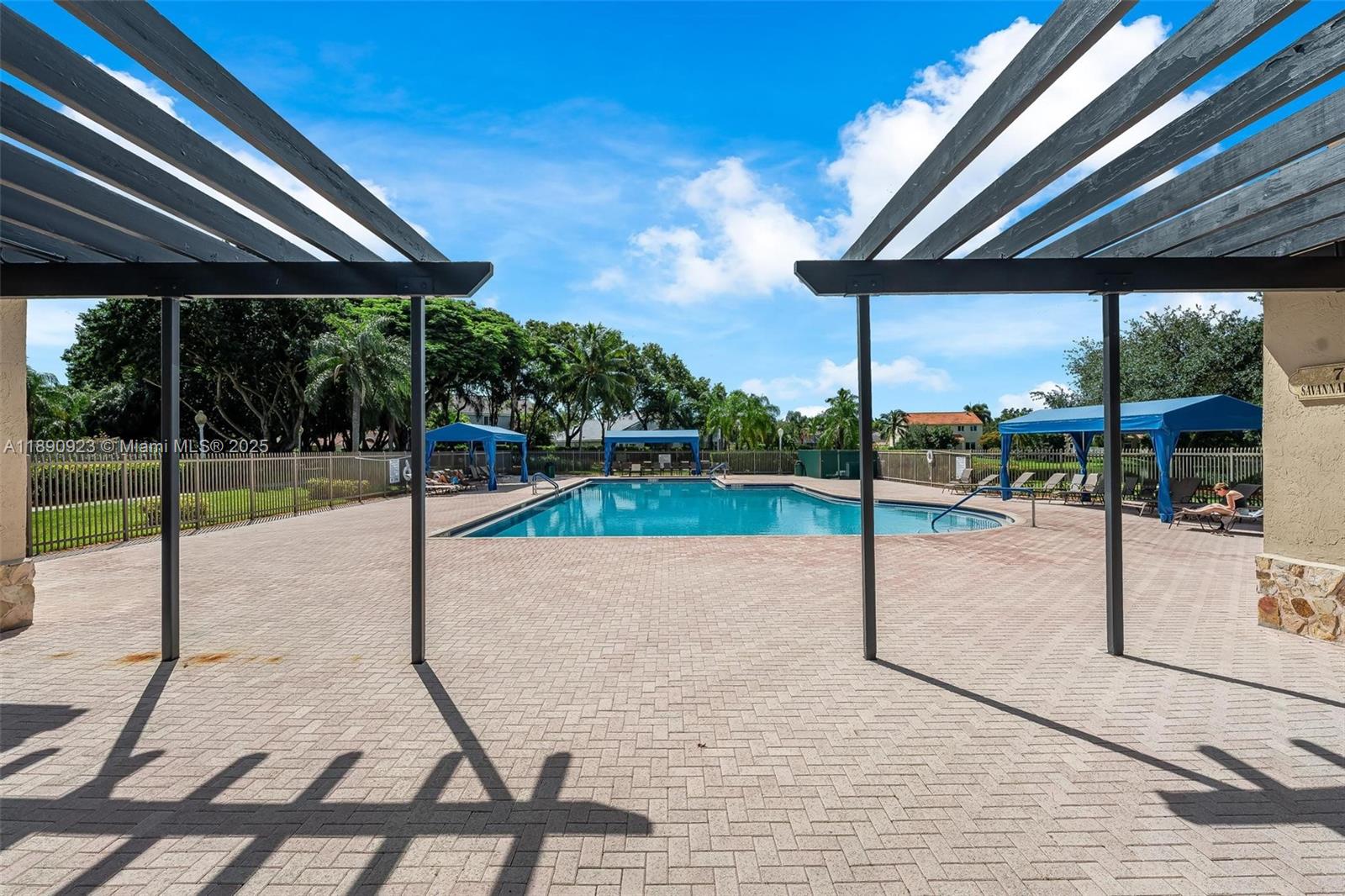 925 Briar Ridge Road Weston, FL 33327 - Photo 28 of 30 a view of a backyard