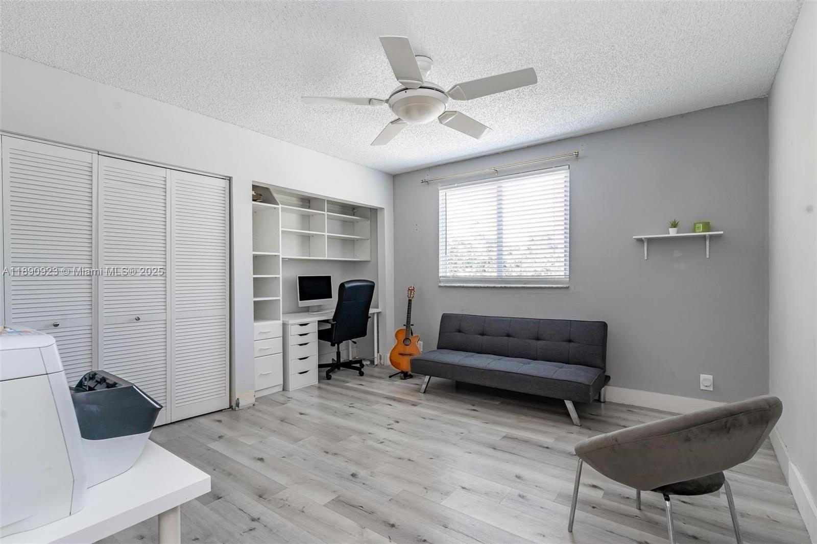 925 Briar Ridge Road Weston, FL 33327 - Photo 6 of 30 a living room with furniture and a window