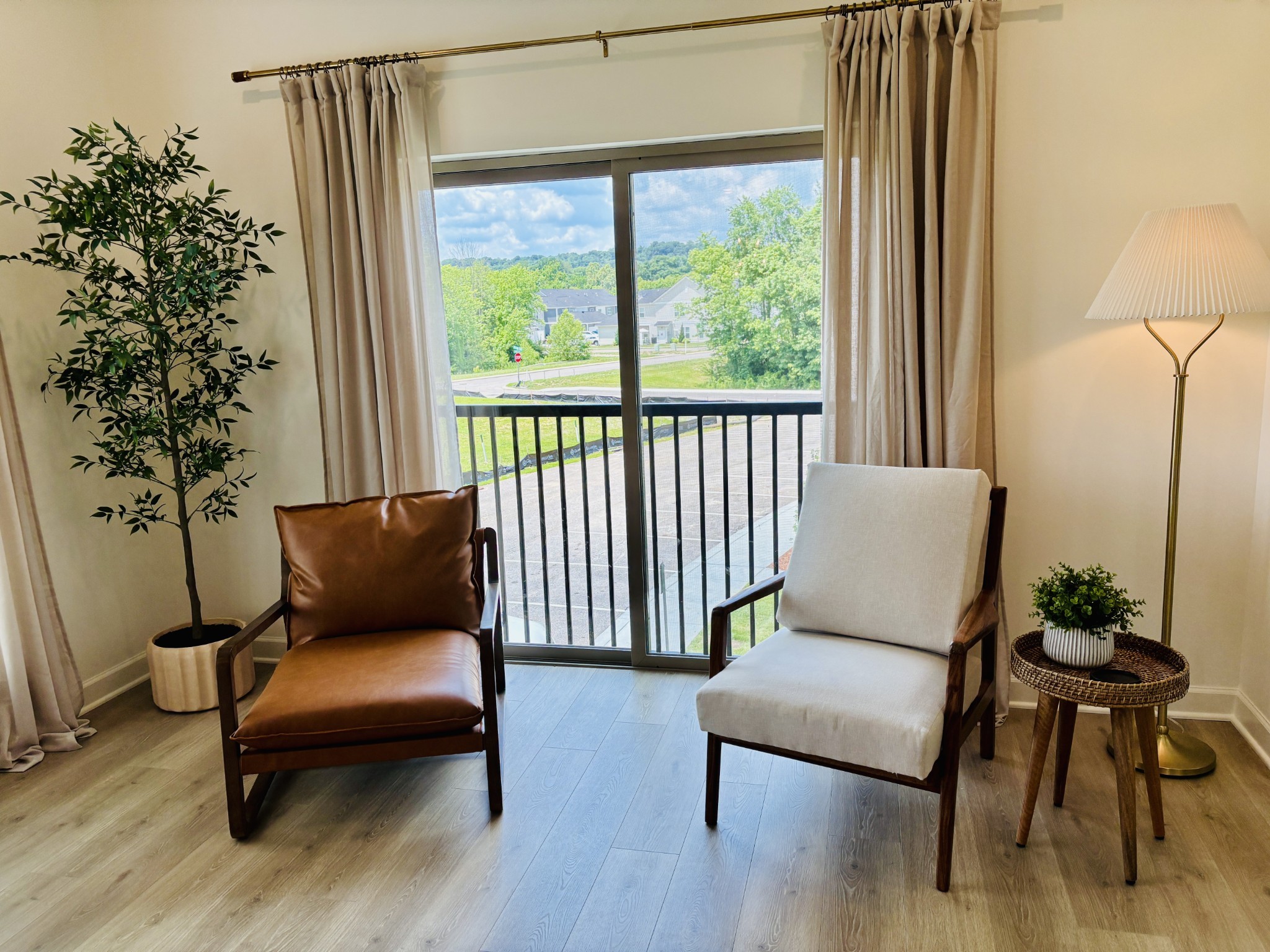 351 Wellows Chase, Unit B Spring Hill, TN 37174 - Photo 13 of 23 a living room with furniture and a potted plant