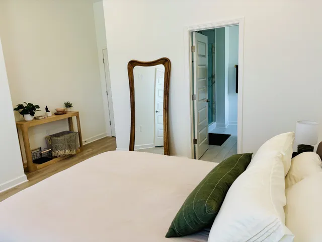 a bedroom with a bed and a fireplace