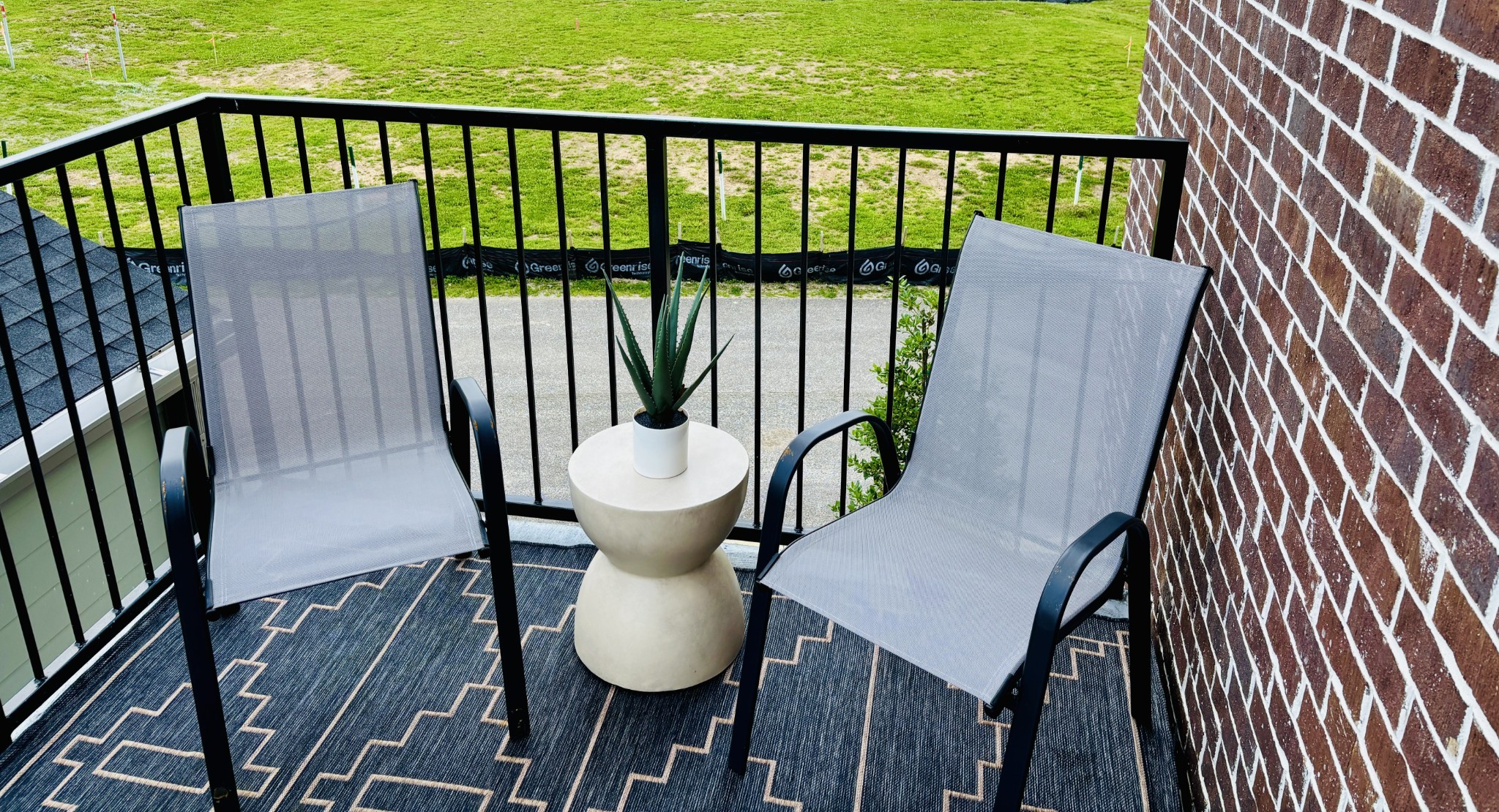 351 Wellows Chase, Unit B Spring Hill, TN 37174 - Photo 20 of 23 a view of a balcony with wooden floor and outdoor seating