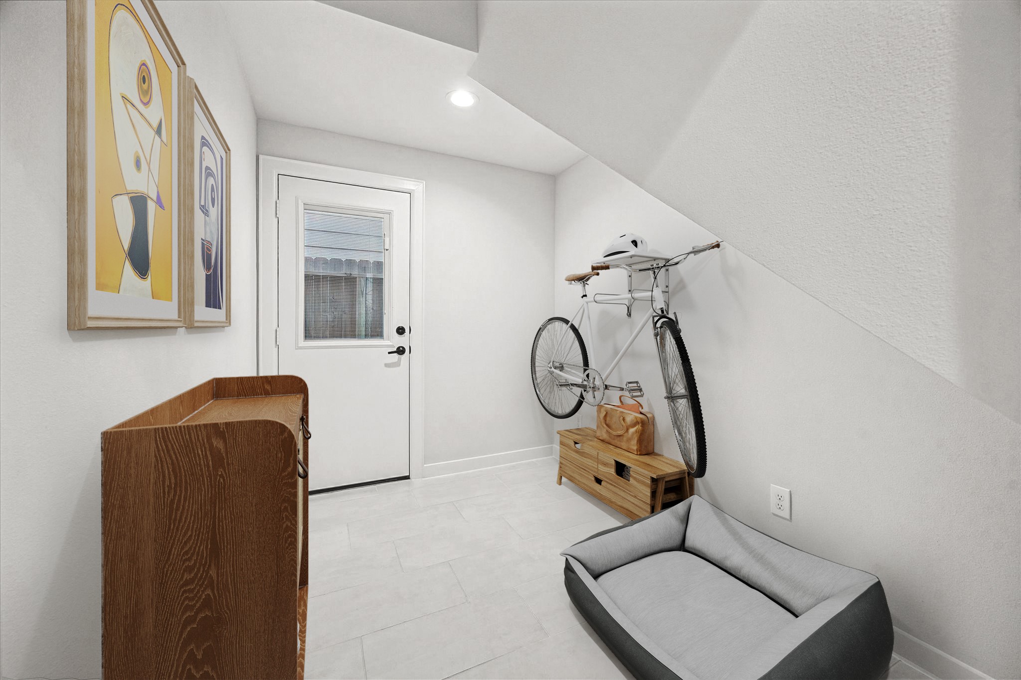 1603 Patterson Street, Unit E Houston, TX 77007 - Photo 7 of 32 This shows same area of the last picture virtually staged for a dog room / bikes storage