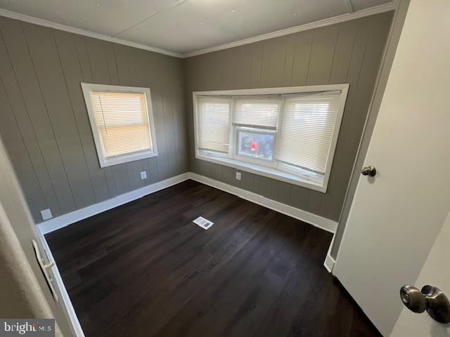 4041 Conowingo Road Darlington, MD 21034 - Photo 4 of 18 an empty room with wooden floor and windows