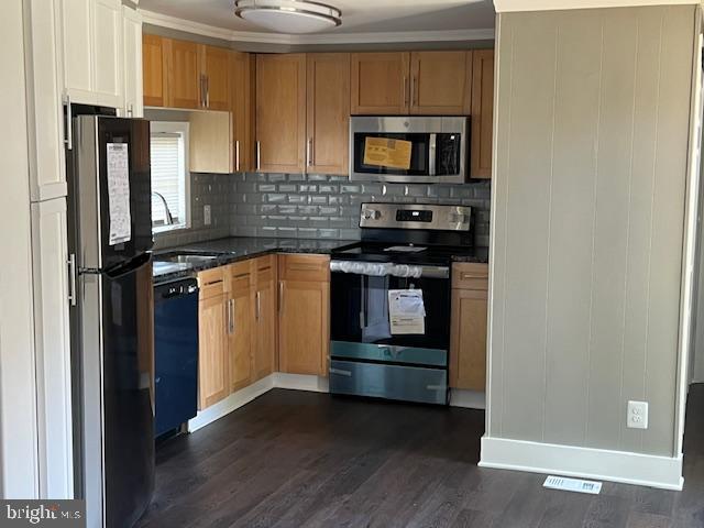 4041 Conowingo Road Darlington, MD 21034 - Photo 10 of 18 a kitchen with a stove microwave and refrigerator