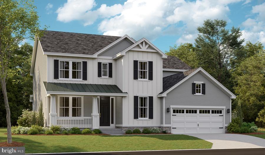 2020 St James Road Accokeek, MD 20607 - Photo 2 of 13 a front view of a house with a yard