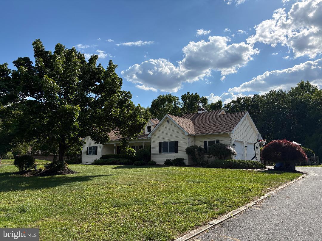 836 Hardingville Road Monroeville, NJ 08343 - Photo 2 of 3 Charming home under a sunny sky.