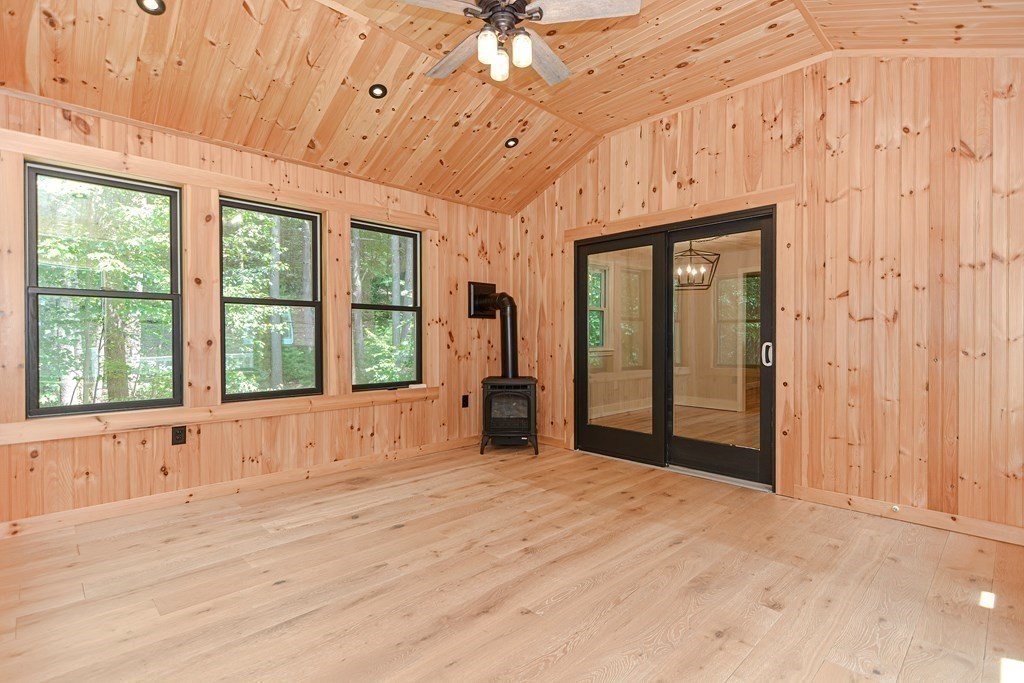 137 Howard Street Northborough, MA 01532 - Photo 15 of 41 a spacious bedroom with a large bed and a large window