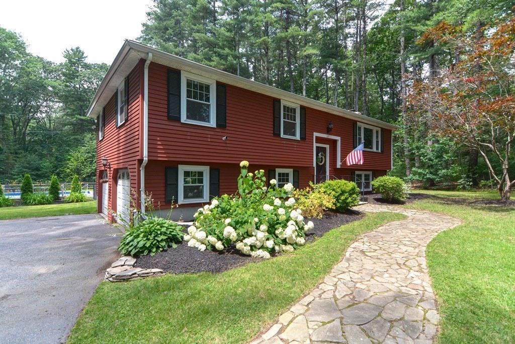 137 Howard Street Northborough, MA 01532 - Photo 2 of 41 a front view of a house with garden