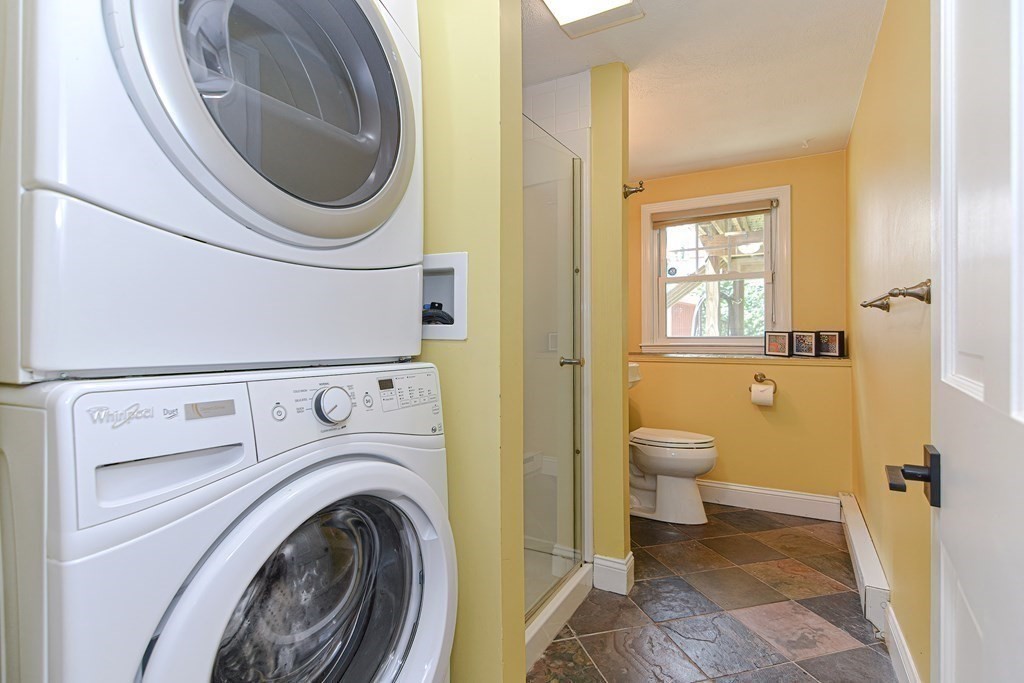 137 Howard Street Northborough, MA 01532 - Photo 26 of 41 a view of a bathroom with a washer and dryer