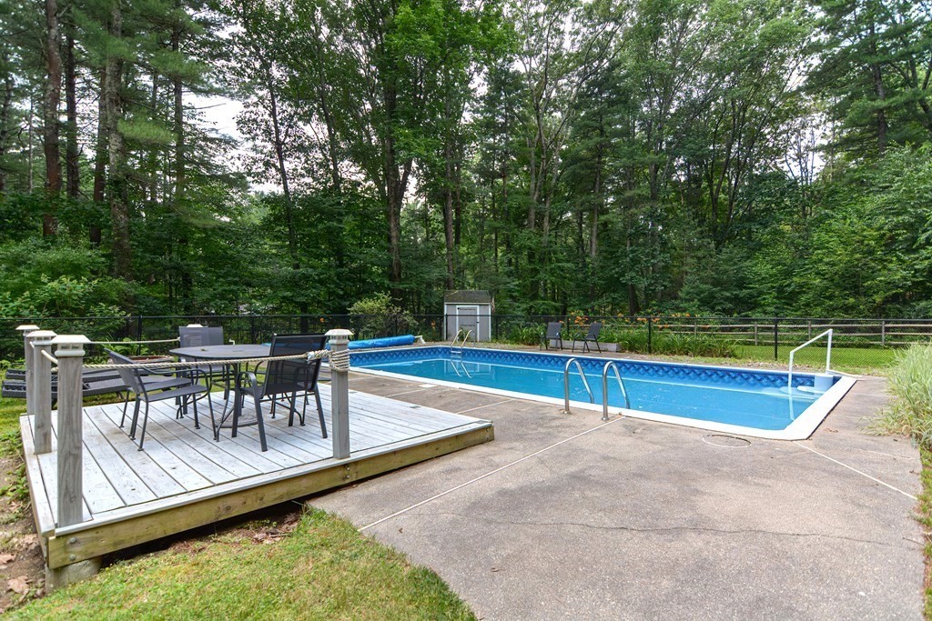 137 Howard Street Northborough, MA 01532 - Photo 37 of 41 a view of a swimming pool with chairs