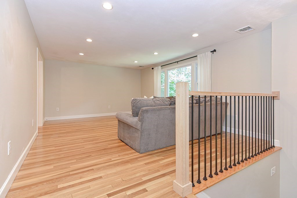 137 Howard Street Northborough, MA 01532 - Photo 5 of 41 a living room with furniture and wooden floor