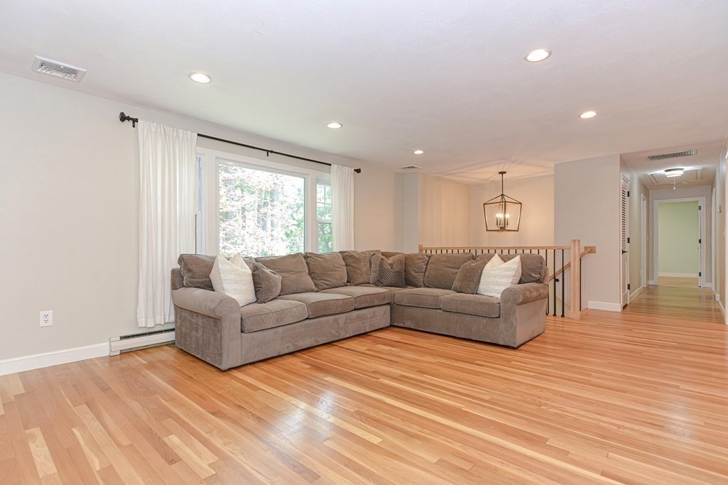 137 Howard Street Northborough, MA 01532 - Photo 6 of 41 a living room with furniture and a large window