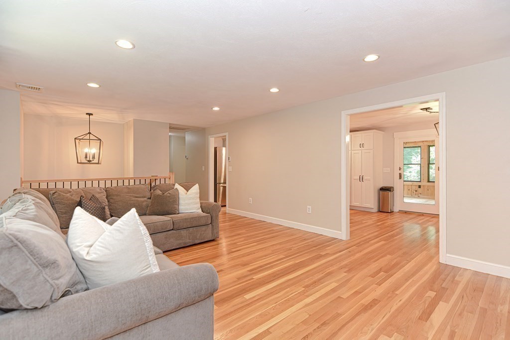 137 Howard Street Northborough, MA 01532 - Photo 8 of 41 a living room with furniture and wooden floor