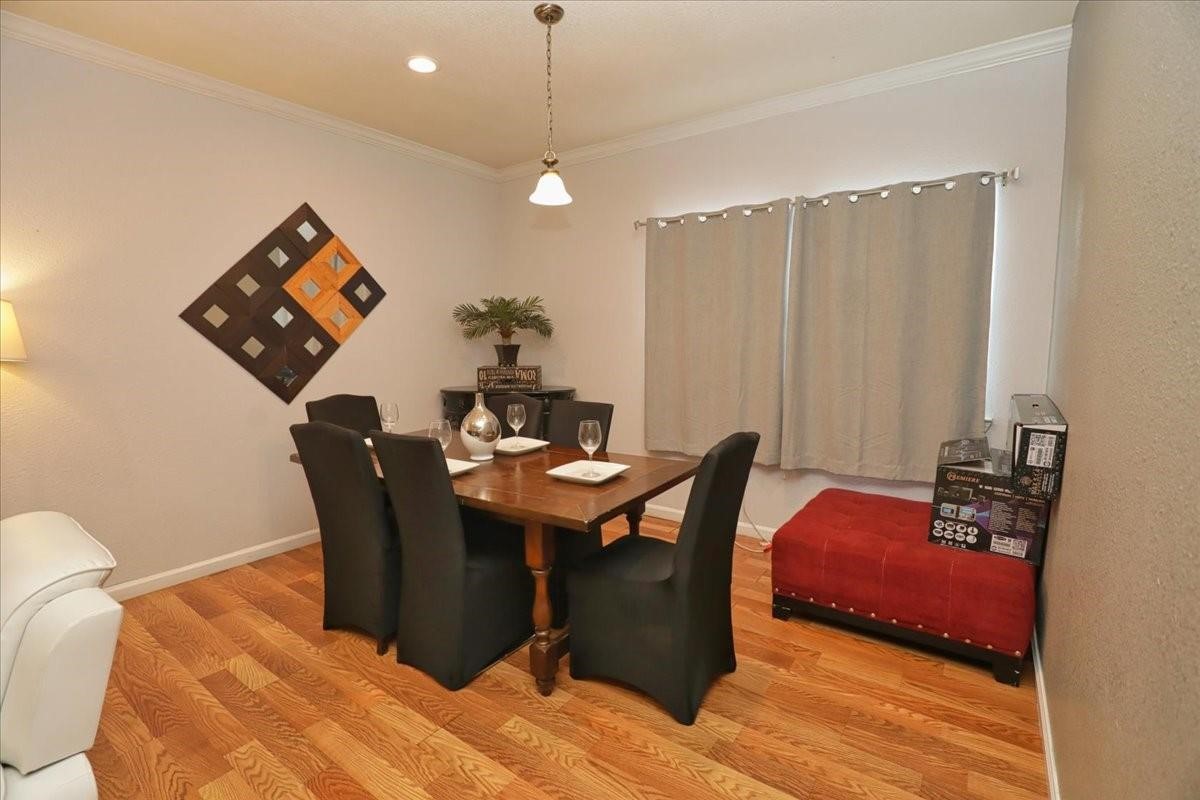 13121 Vickery Street, Unit 5 Houston, TX 77039 - Photo 39 of 40 a view of a dining room with furniture