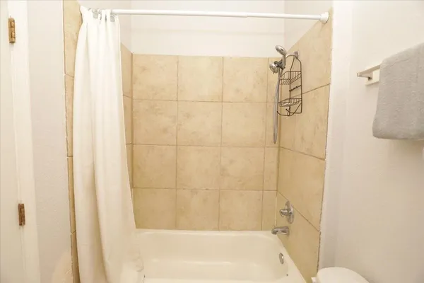 a bathroom with a bathtub