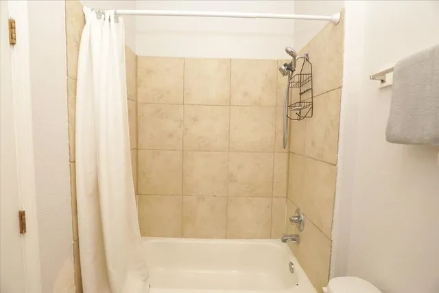 a bathroom with a bathtub