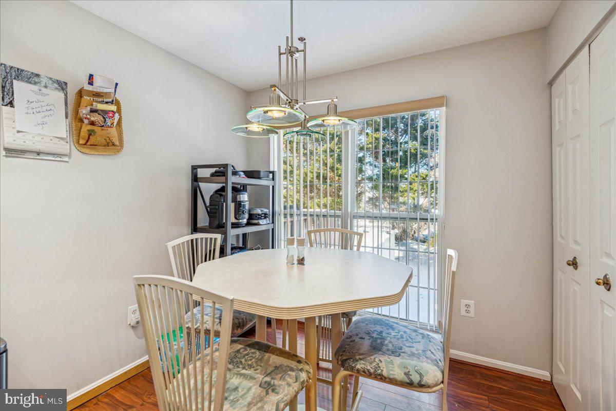 7536 Maury Road Windsor Mill, MD 21244 - Photo 14 of 36 a dining room with furniture window and outside view