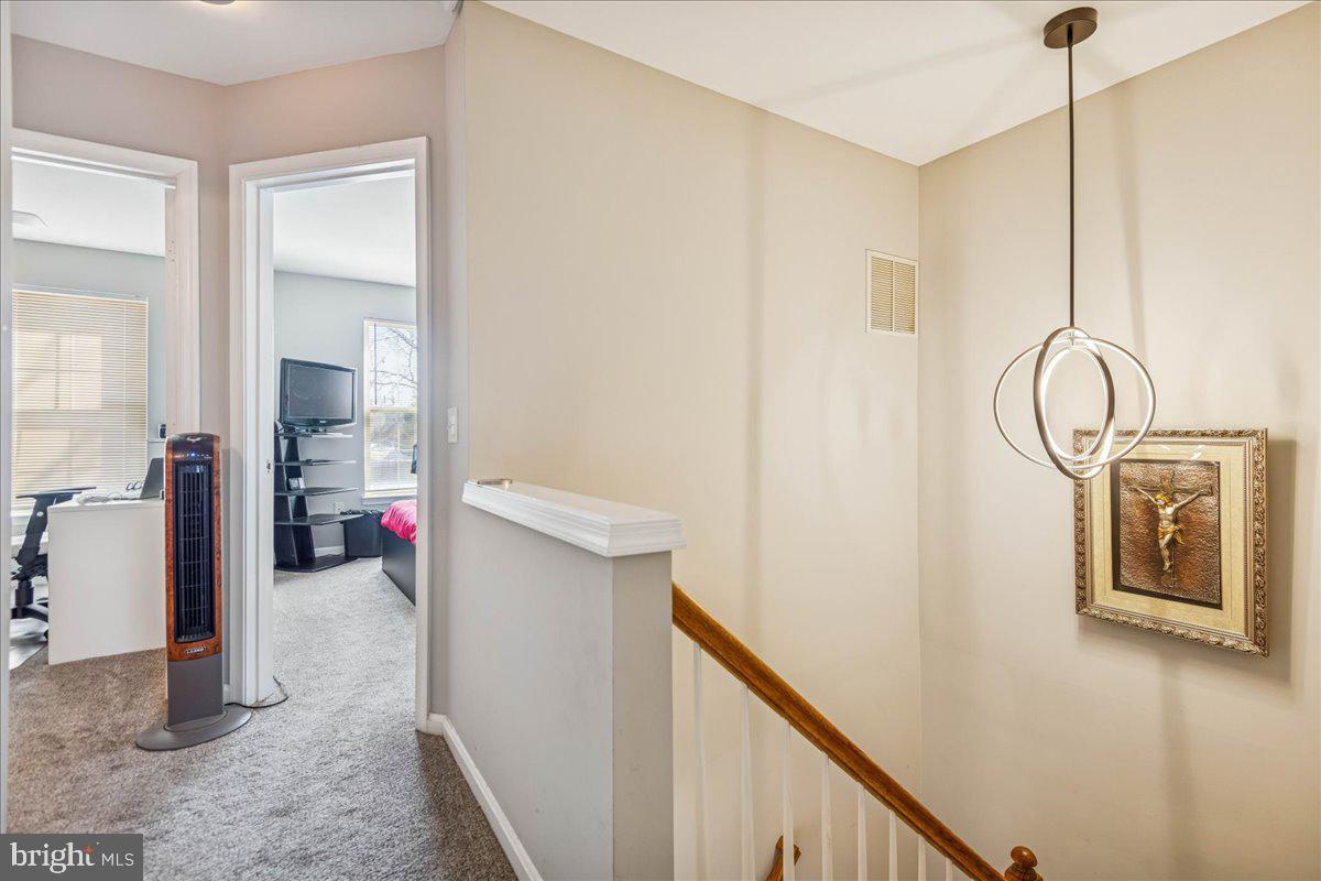 7536 Maury Road Windsor Mill, MD 21244 - Photo 16 of 36 a view of a livingroom with furniture
