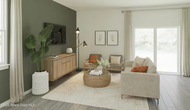 a living room with furniture and a window