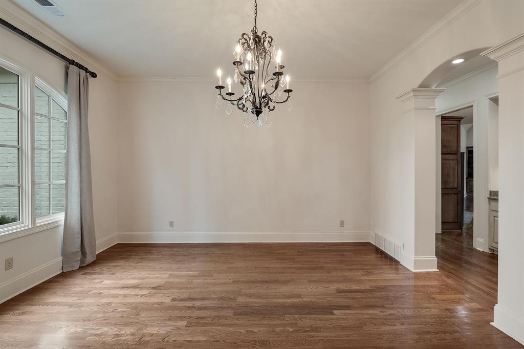 1185 Braystone Trail Collierville, TN 38017 - Photo 11 of 39 an empty room with wooden floor and windows