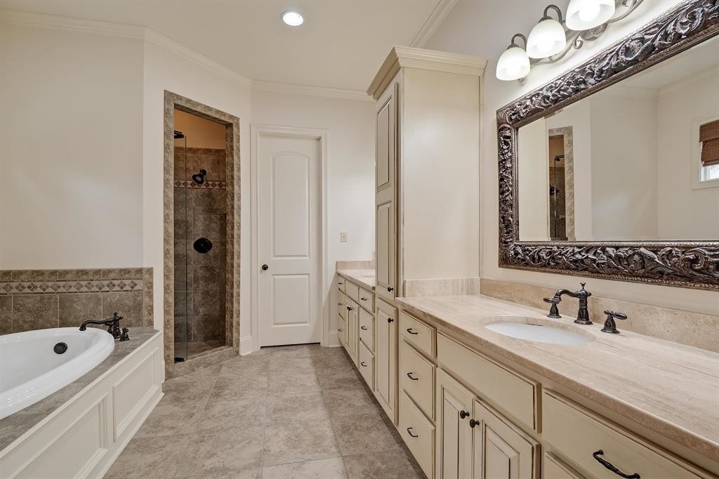 1185 Braystone Trail Collierville, TN 38017 - Photo 15 of 39 a bathroom with a double vanity sink mirror double and bathtub