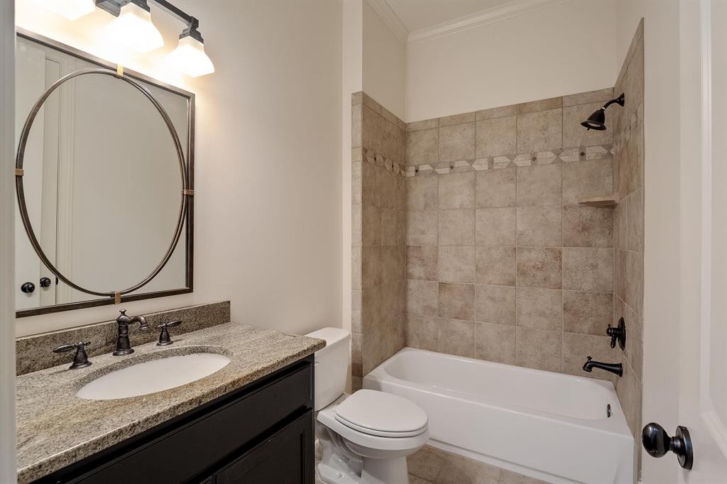 1185 Braystone Trail Collierville, TN 38017 - Photo 18 of 39 a bathroom with a granite countertop sink toilet and shower