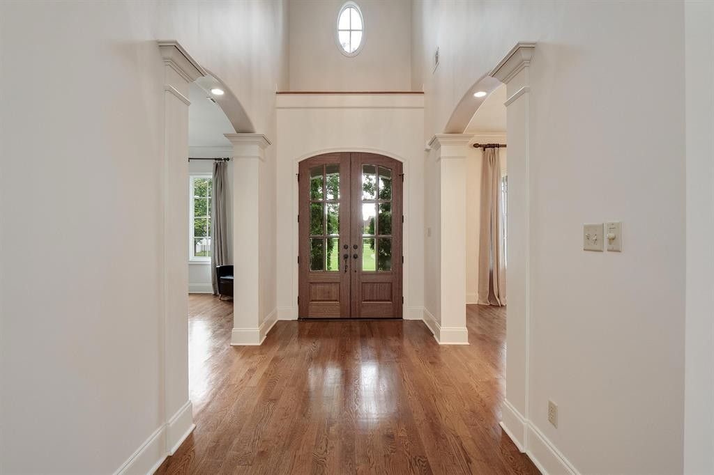 1185 Braystone Trail Collierville, TN 38017 - Photo 2 of 39 wooden floor in an empty room with a window