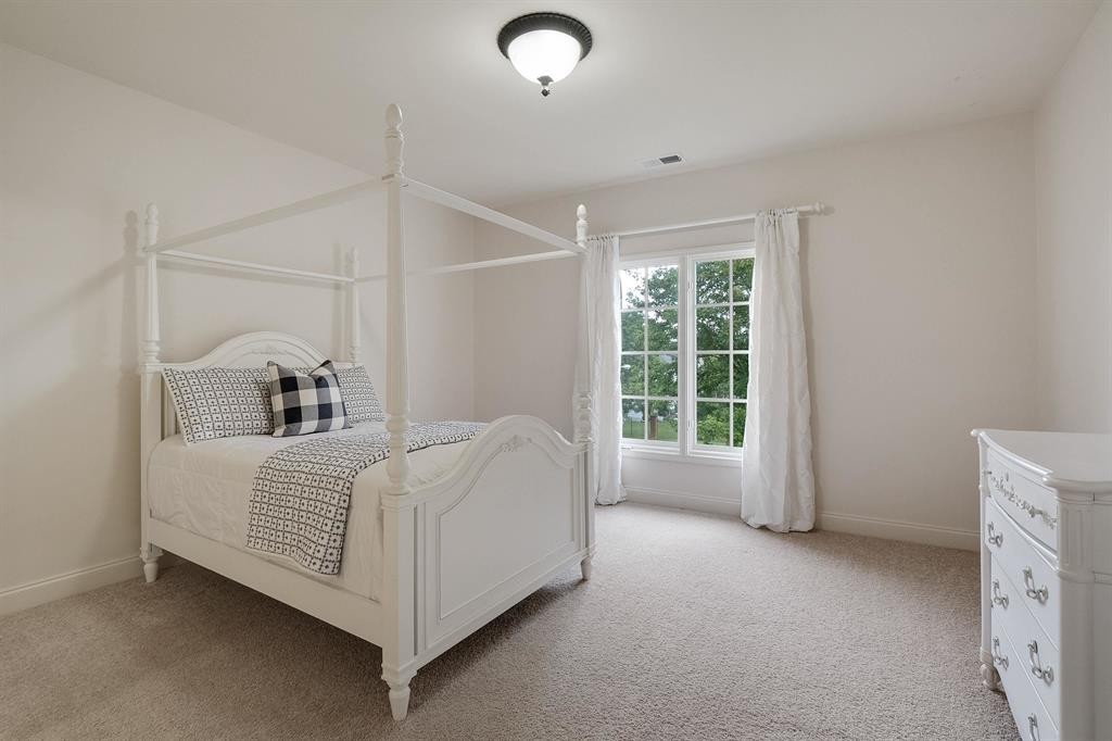 1185 Braystone Trail Collierville, TN 38017 - Photo 21 of 39 a bed room with a bed and a window